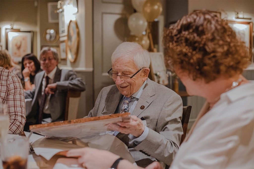 male resident celebrating his birthday in a private dining room with loved ones