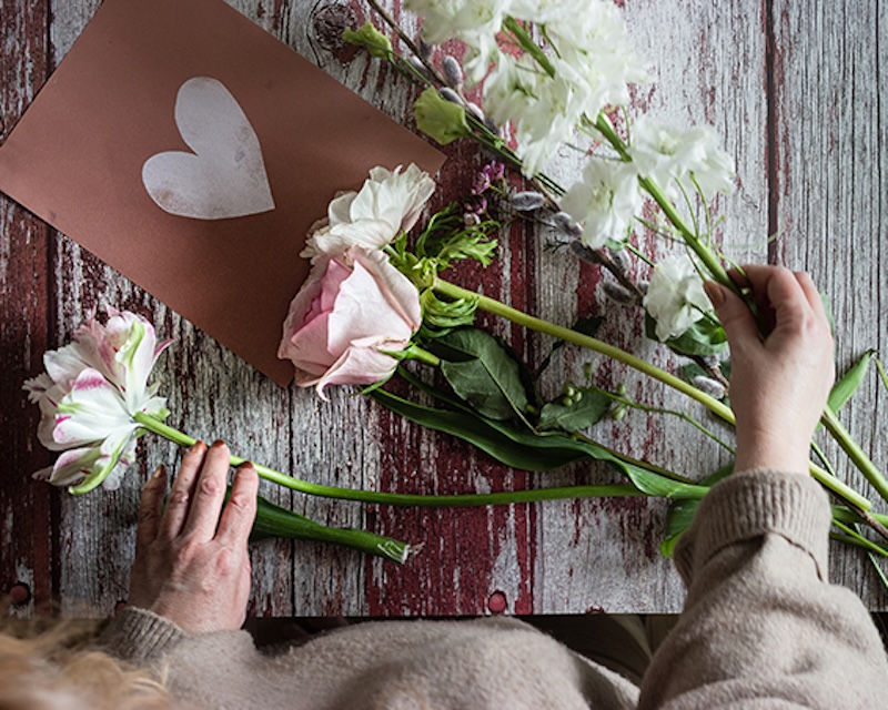 resident doing flower arranging